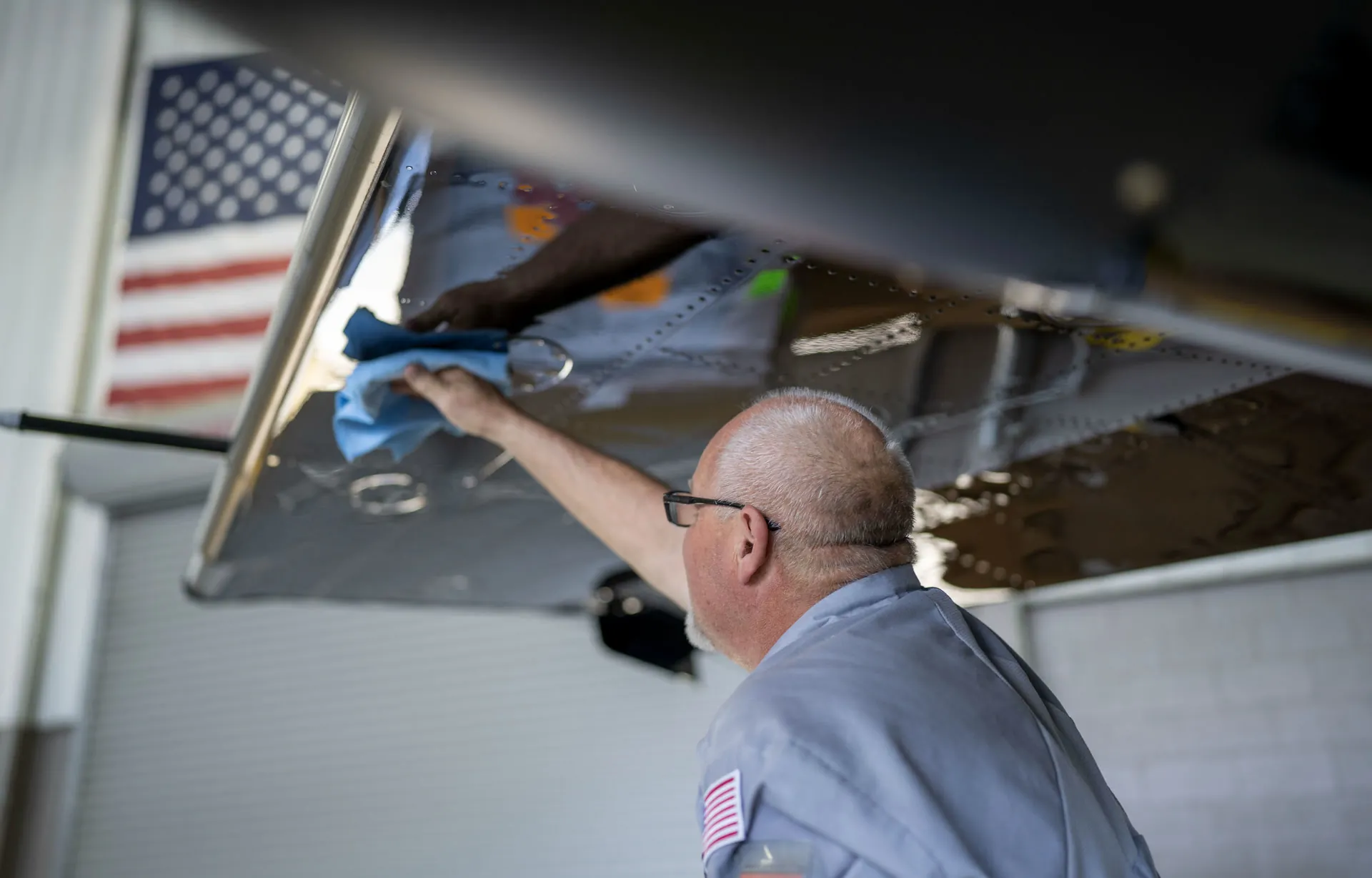 Maintenance technician with aircraft